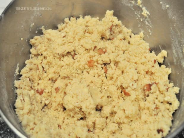 Dough for the snowball cookies is very thick and slightly crumbly.