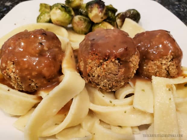 The homemade egg noodles served with turkey meatball croquettes, along with Brussel sprouts.