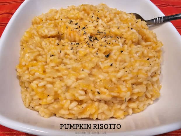 Creamy Pumpkin Risotto is a delicious, meatless dish made with Arborio rice, veggie broth, white wine, butter, pumpkin, ginger and basil.