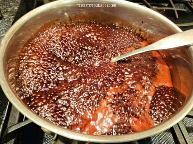 As the syrup boils, it rises in the pan, so it is stirred constantly.