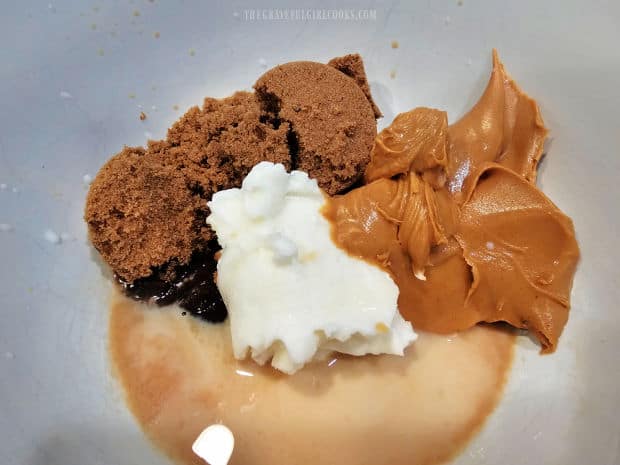 Peanut butter, shortening, brown sugar, milk and vanilla in mixing bowl.