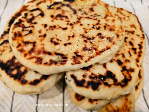 Cooked Garlic Butter Naan Bread, ready to be eaten warm.