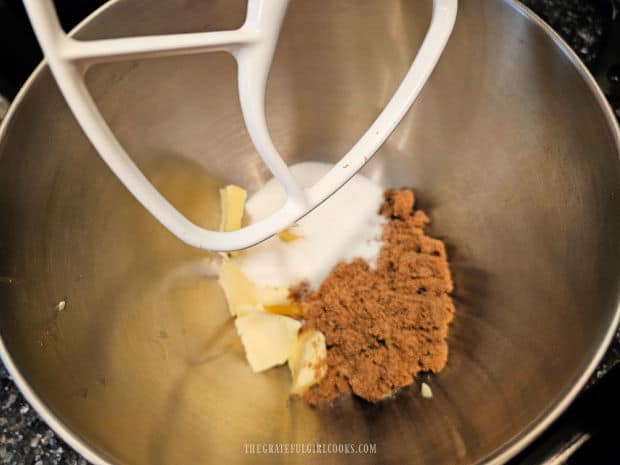 Butter, brown sugar and granulated sugar are beaten with a mixer.