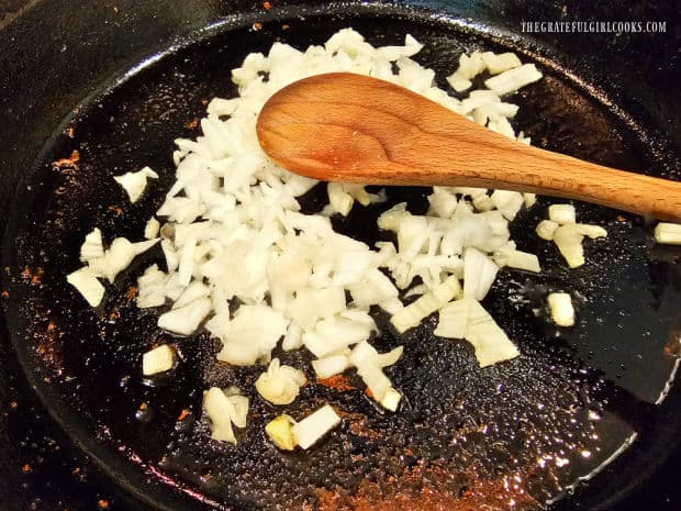 Chopped onions are cooked in a little of the leftover bacon grease.