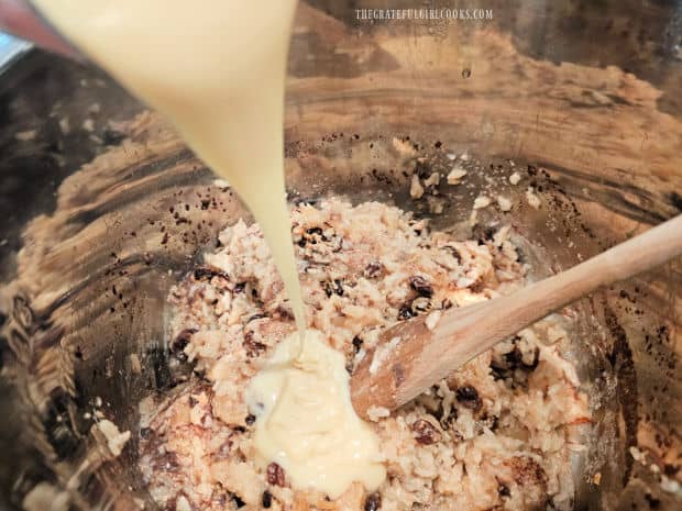 Condensed milk is poured into the rice pudding in the Instant Pot.