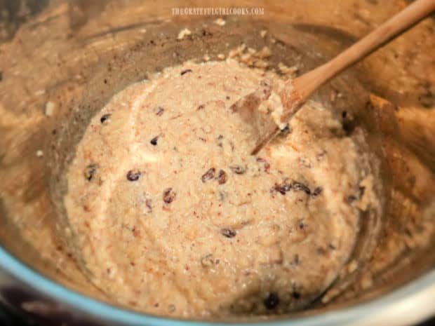 Rice pudding in the Instant Pot is ready to be transferred into dishes.