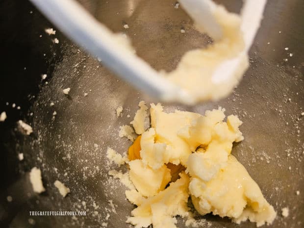 Eggs are added to butter and sugar mixture and beaten, one at a time.