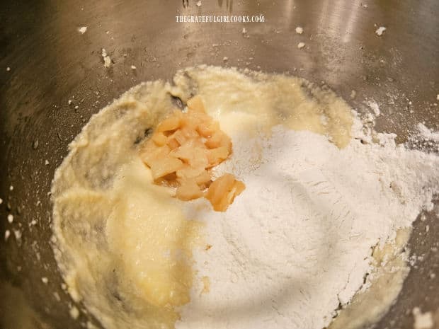 Flour mixture and pineapple tidbits are added to the bread batter.