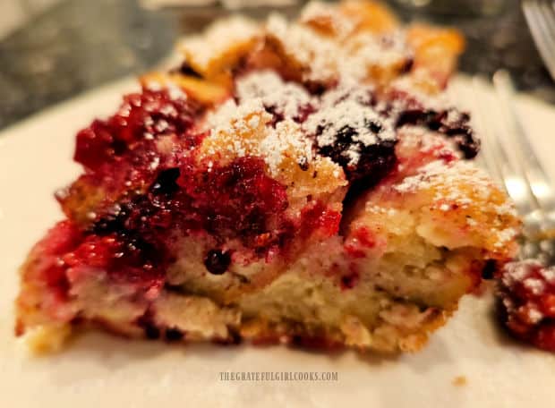 Sifted powdered sugar garnishes each piece of the French Toast bake.