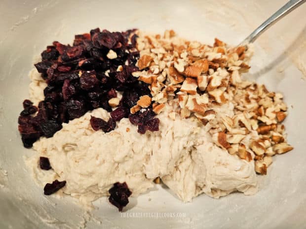 Chopped pecans and dried cranberries are added to the bread dough.