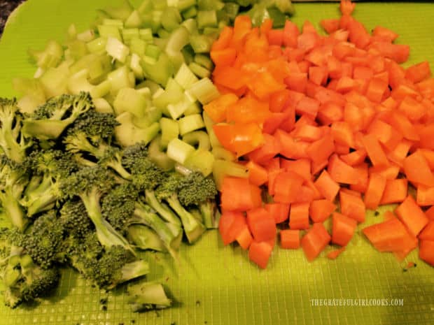 Some chopped veggies used are broccoli, carrots, celery and green bell pepper.