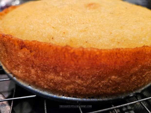 The cornbread is removed from the springform pan, and cools slightly.