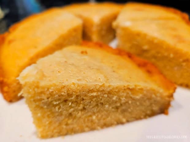 Instant Pot Cornbread is cut into wedges and served warm.