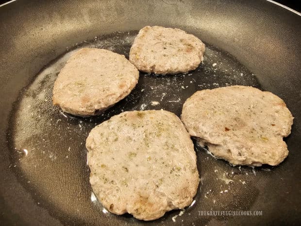 Sausage patties are flipped halfway through the cooking time.