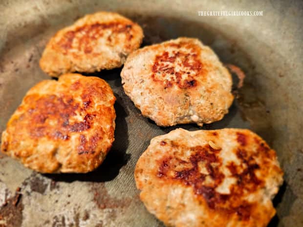 Ground pork sausage patties are done when browned and fully cooked through.