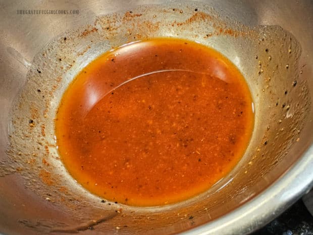 The salad dressing for the Mediterranean chickpea salad is mixed and ready.