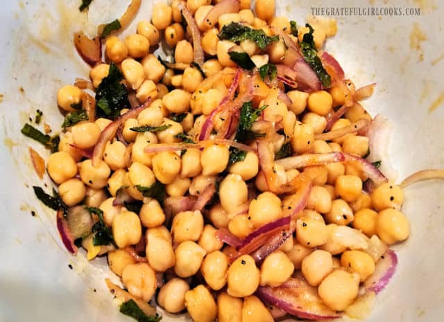 After tossing, the Mediterranean garbanzo bean salad is ready to be served.