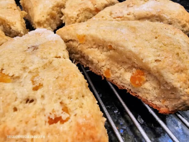 Scones are separated and cool on a wire rack before glazing.