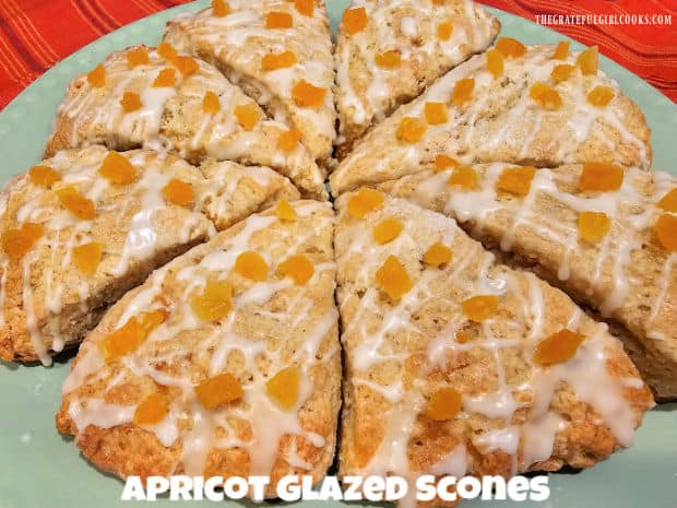 Make 8 tasty Apricot Glazed Scones from scratch, filled with apricot jam and dried apricots, and topped with glaze and more dried apricots!