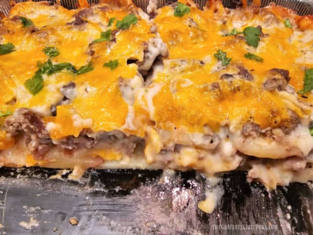 After being sliced, a peek inside reveals layers of potatoes, cheese and beef.