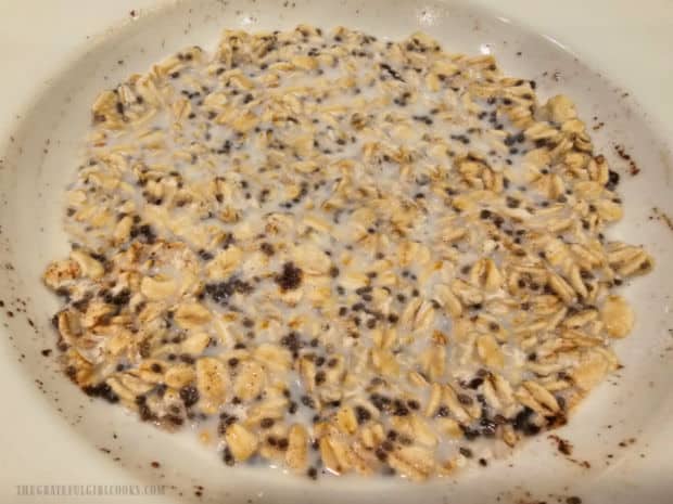 Oats, cinnamon and chia seeds are soaked overnight in milk and maple syrup.