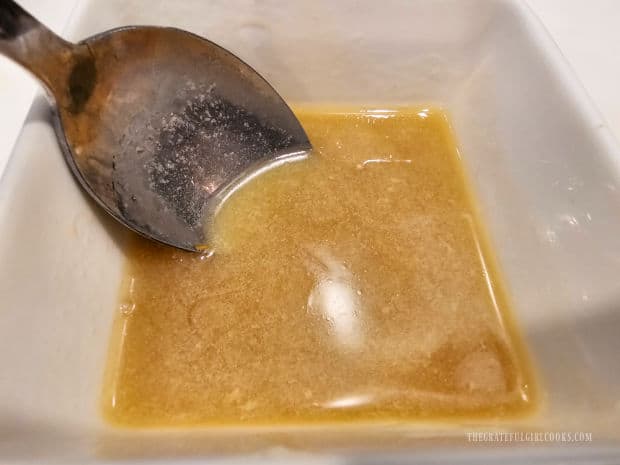 Melted butter and honey (or maple syrup) are stirred until combined.