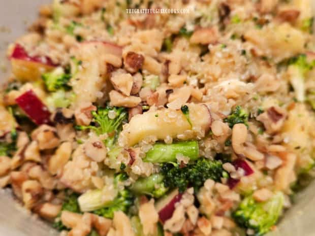 After mixing the salad dressing in, the broccoli apple quinoa salad is ready to eat.