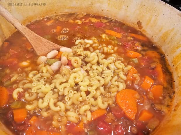 Uncooked macaroni noodles and white beans are added to the easy lentil minestrone.